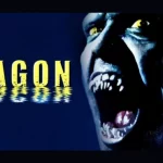 Visage monstrueux avec dents acérées sur fond bleu sombre et le titre DAGON en jaune